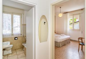 Koupelna v ubytování Hotel Ambra