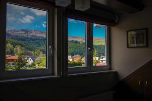 Γενική θέα στο βουνό ή θέα στο βουνό από  αυτό το δωμάτιο σε οικογενειακή κατοικία