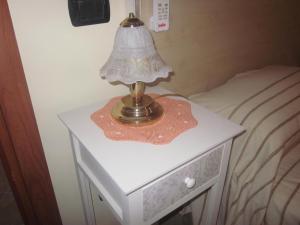 Postel nebo postele na pokoji v ubytování B&B Vaiana