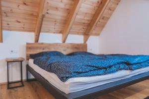 Postel nebo postele na pokoji v ubytování Apartmány Pod Jelenkou
