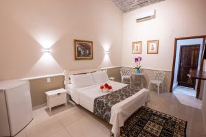 Postel nebo postele na pokoji v ubytování Pousada Villa das Pedras + 147 fotografií