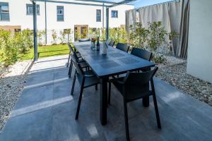 Patio lub wspólna przestrzeń na świeżym powietrzu w obiekcie PINNA RESIDENCE - Supin