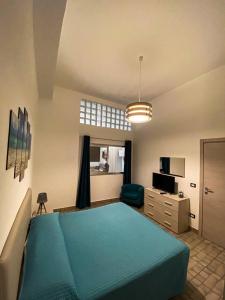 Кровать или кровати в номере Naxos Apartments