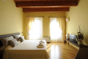 Posteľ alebo postele v izbe v ubytovaní Piazza Azuni 18 Guest House