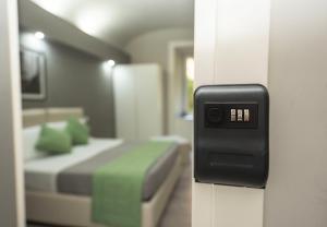 A bed or beds in a room at Scipioni Best Rooms