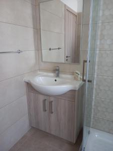 Koupelna v ubytování Proteas Mare Suites