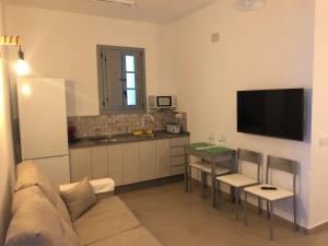 Kuchyňa alebo kuchynka v ubytovaní Apartamentos Casa la Costanilla
