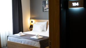 HA Hotel Mostar客房内的一张或多张床位