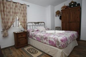 Voodi või voodid majutusasutuse Casa de la Abuela toas