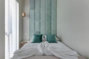 Posteľ alebo postele v izbe v ubytovaní Wave Apartments - Yacht Park