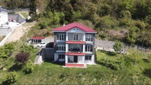 an aerial view of a house on a hill at GARDEN PALACE VILLA in Trabzon
