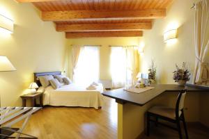 Posteľ alebo postele v izbe v ubytovaní Piazza Azuni 18 Guest House