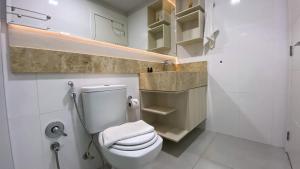 Koupelna v ubytování Locar-in Canela - Apto junto a Rua Coberta Canela + 39 fotografií