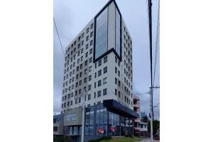 an office building with a glass facade at Paseo Del Molino - 703 in Caxias do Sul