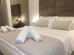 Posteľ alebo postele v izbe v ubytovaní Perla Luxury Apartment