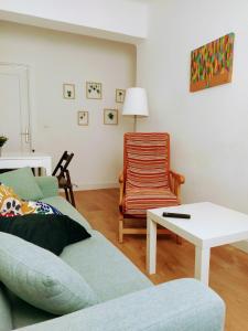 Ein Sitzbereich in der Unterkunft Victoria home