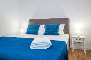 Postel nebo postele na pokoji v ubytování Apartment Oli