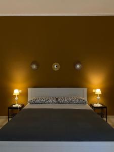 Postel nebo postele na pokoji v ubytování Nenetta Rooms & Suites Monopoli