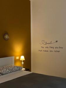 Postel nebo postele na pokoji v ubytování Nenetta Rooms & Suites Monopoli