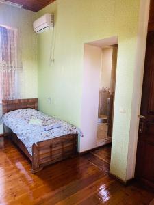 Voodi või voodid majutusasutuse Guesthouse Kamelia toas