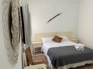 Postel nebo postele na pokoji v ubytování CASA DEL DELTA