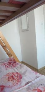 Postel nebo postele na pokoji v ubytování Apartman Zvončica