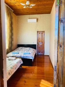Voodi või voodid majutusasutuse Guesthouse Kamelia toas