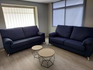 Ein Sitzbereich in der Unterkunft Apartamento Vistas Pedrido