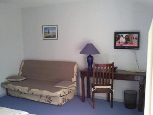 Posezení v ubytování Logis L'Auberge du Quercy Blanc
