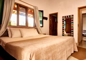 Letto o letti in una camera di Mansión by Bernalo Hotels