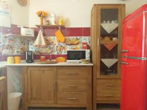 Kuchyň nebo kuchyňský kout v ubytování Holiday Room Sa Tebia