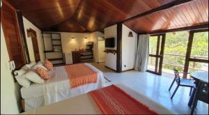 a bedroom with a large bed in a room at Vivant Eco Resort apartamento in Barra Grande +32 photos
