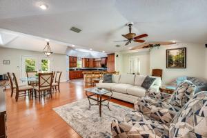 a living room with a couch and a table at The Tree House in Middleburg