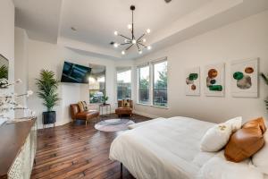 a bedroom with a large bed and a living room at Pool house with hot tub and cinema in Corinth +51 photos