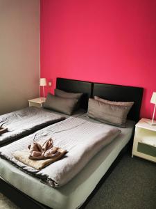 Postel nebo postele na pokoji v ubytování Dithmarscher Haus