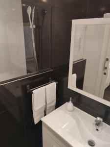 Ένα μπάνιο στο Bonito Loft en Ermua. Cómodo y funcional.