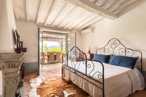 Кровать или кровати в номере Tenuta Colle Sala - Country House & Suites