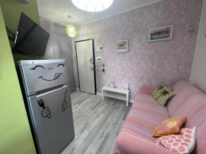 Телевизор и/или развлекательный центр в Appartamento Affaccio sul mare, Baia di Copanello