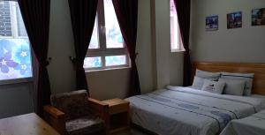 Postel nebo postele na pokoji v ubytování Starhill Hotel