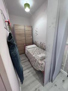 Кровать или кровати в номере Appartamento Affaccio sul mare, Baia di Copanello