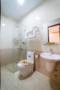 Koupelna v ubytování Starhill Hotel + 34 fotografií