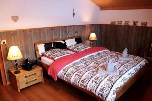 Кровать или кровати в номере Akelei