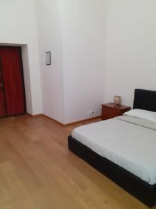 Postel nebo postele na pokoji v ubytování R.T. HOUSE'S