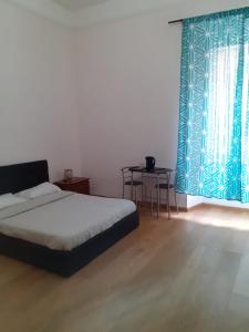 Postel nebo postele na pokoji v ubytování R.T. HOUSE'S