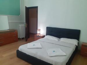 Postel nebo postele na pokoji v ubytování R.T. HOUSE'S