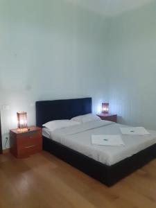 Postel nebo postele na pokoji v ubytování R.T. HOUSE'S