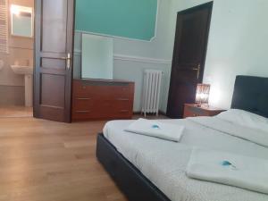 Postel nebo postele na pokoji v ubytování R.T. HOUSE'S