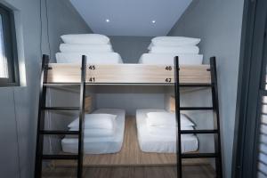 Postel nebo postele na pokoji v ubytování Liuqiu Dive Hostel