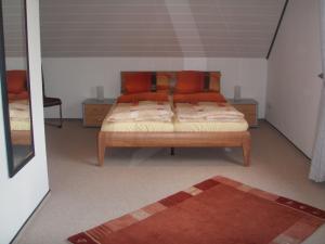 Ένα ή περισσότερα κρεβάτια σε δωμάτιο στο Ferienhaus am Ternscher See