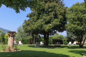 Aed väljaspool majutusasutust Villa Garni Gardenia